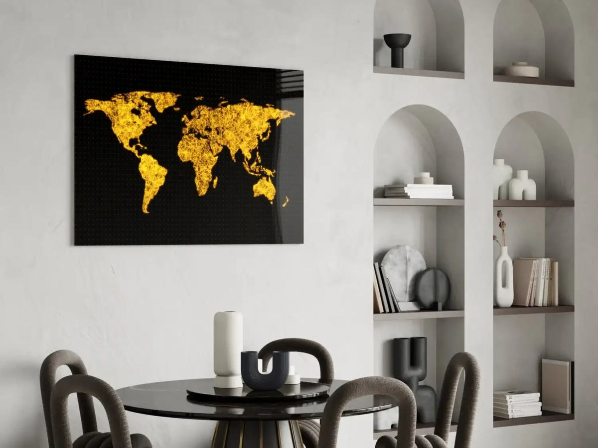 World map art piece on a wall above a dining table with shelves in the background.