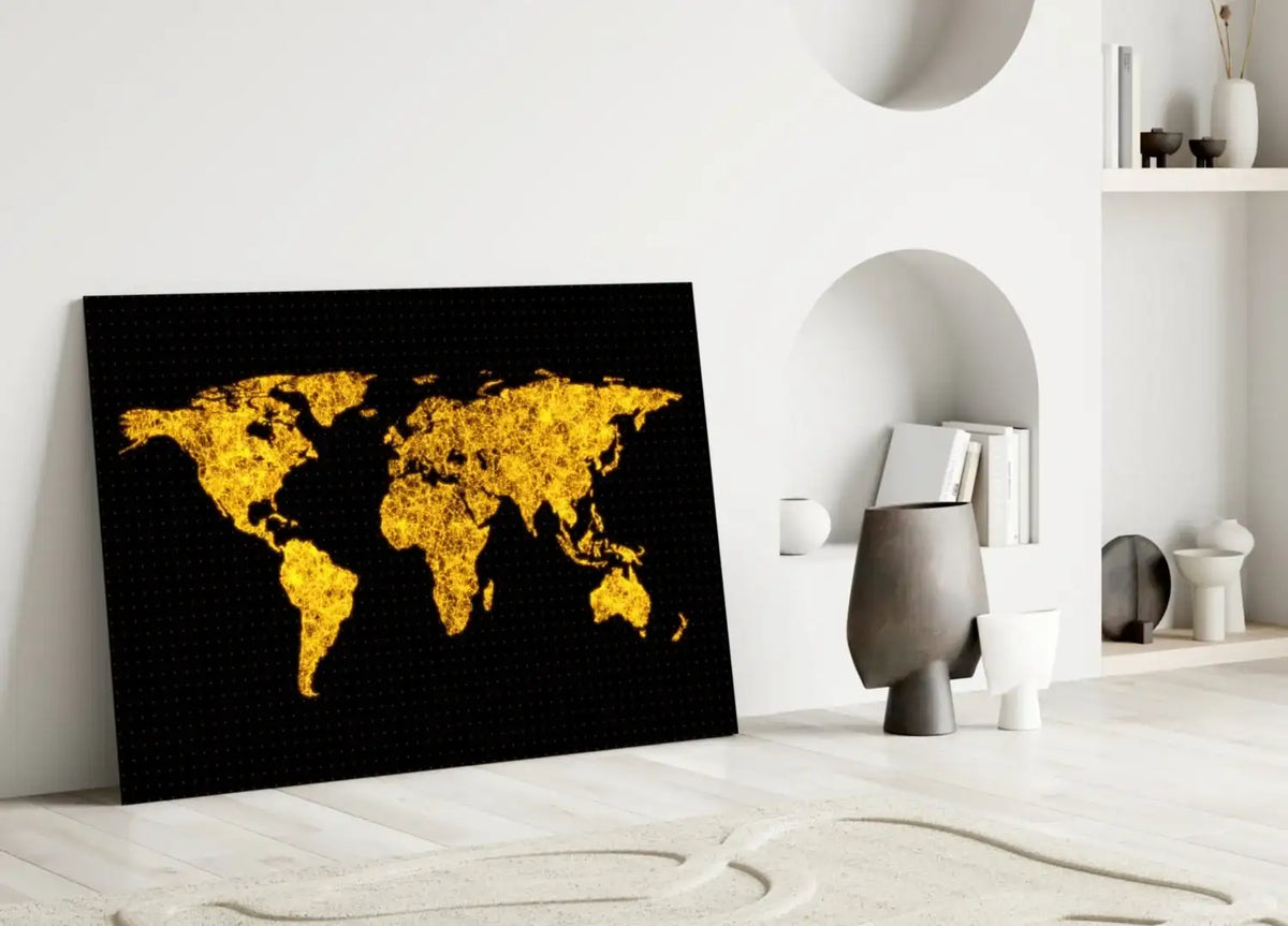 World map art piece on a black background in a modern room.